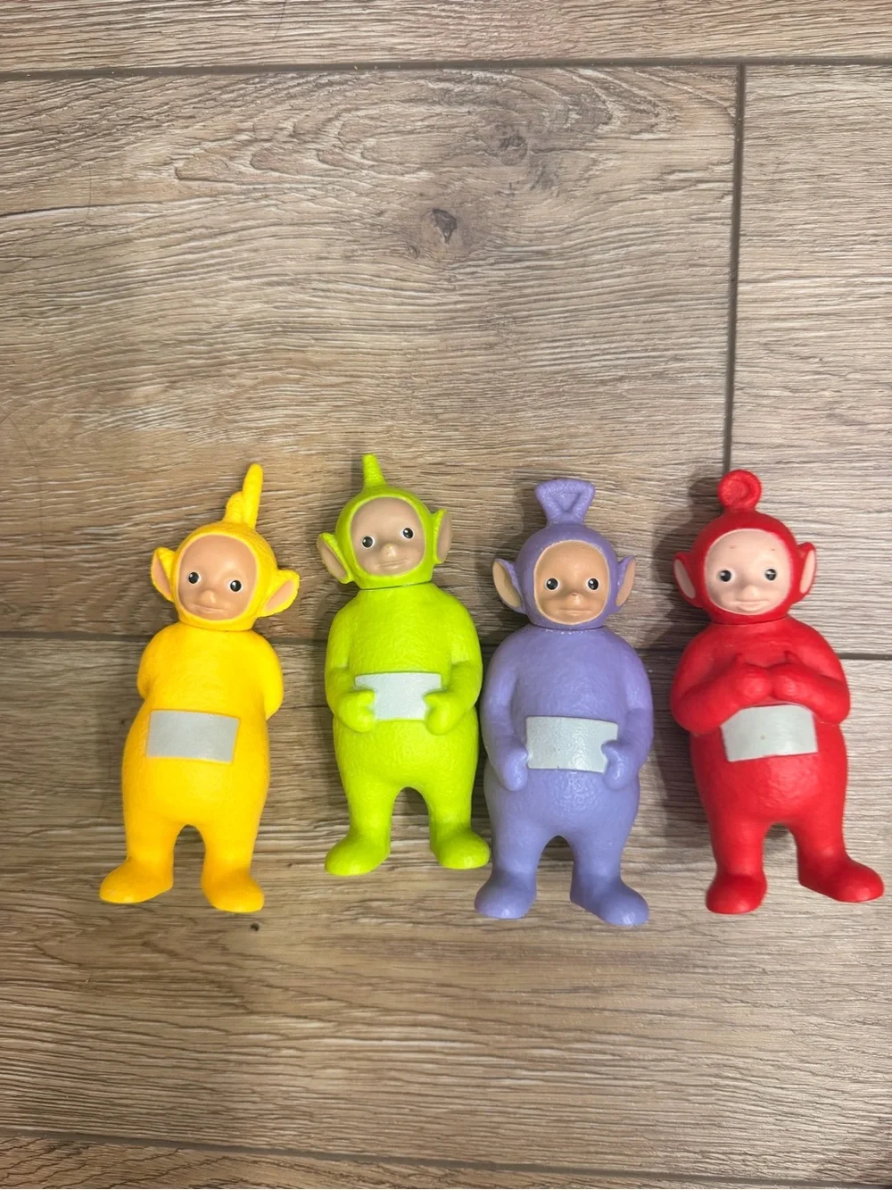 Set of Four Colorful Soft Vinyl Character Figures - Yellow, Green, Purple, Red
